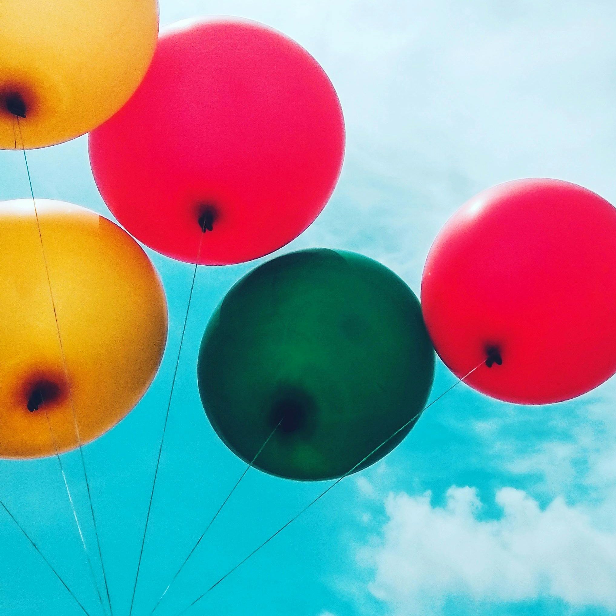 Balloons floating in the sky