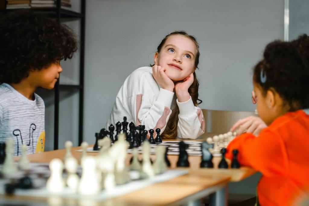 kids playing chess together