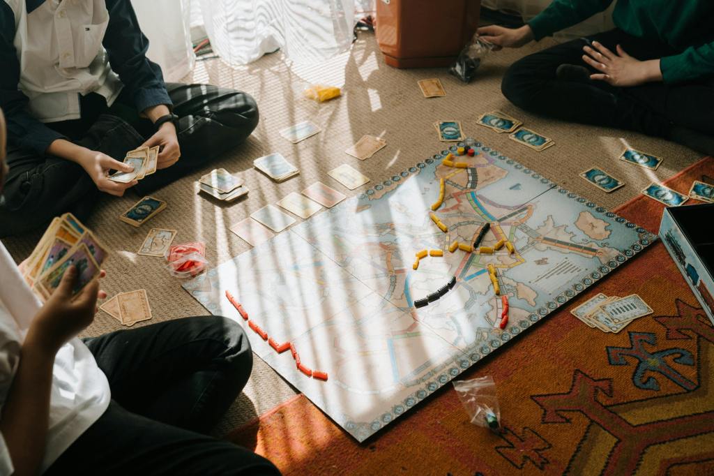 family playing a board game together